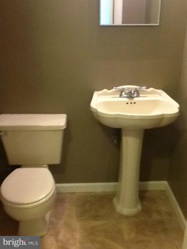 1320 Apple Ridge Court Edgewood, MD 21040 - Photo 23 of 26 a bathroom with a sink toilet and a mirror