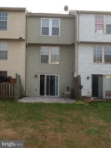 1320 Apple Ridge Court Edgewood, MD 21040 - Photo 25 of 26 a brick house with a yard in front of it