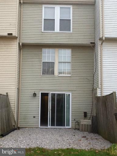 1320 Apple Ridge Court Edgewood, MD 21040 - Photo 26 of 26 a view of a brick house with small yard