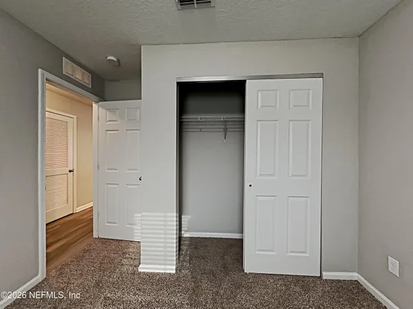 a view of a livingroom with a window