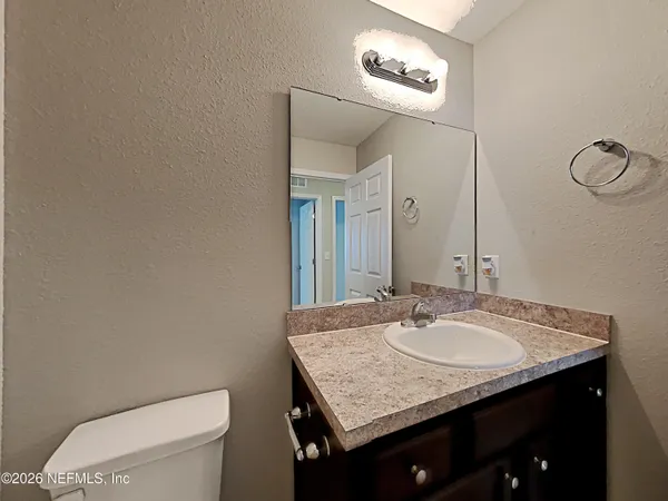 a bathroom with a shower and a bath tub