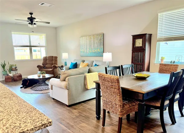 a room with furniture and a book shelf