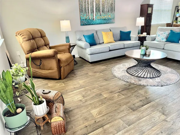 a view of a workspace with furniture and a bedroom