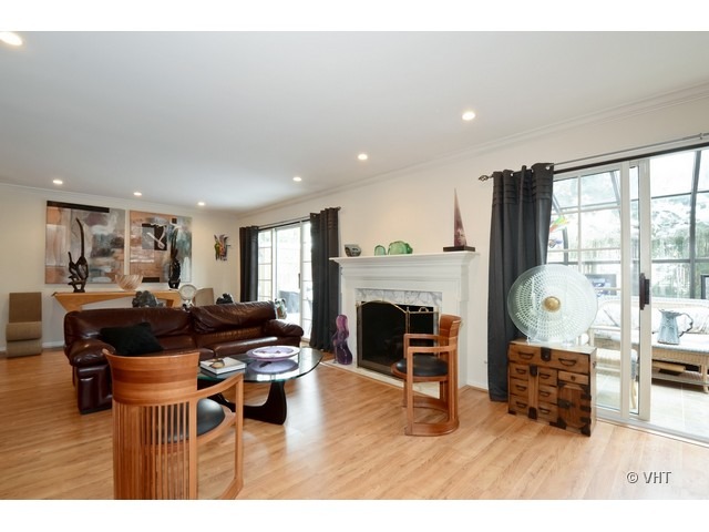 15 Landmark Street Northfield, IL 60093 - Photo 4 of 22 a living room with furniture and a fireplace