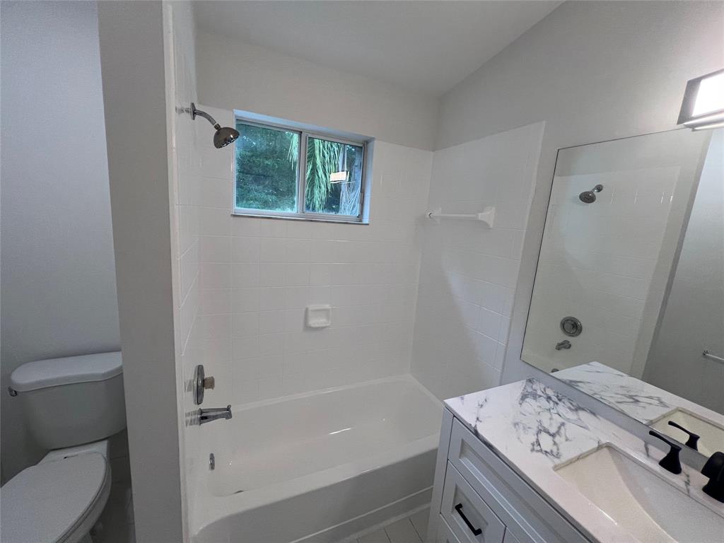 14156 Southwest 179th Terrace Miami, FL 33177 - Photo 20 of 37 a bathroom with a sink a toilet and shower