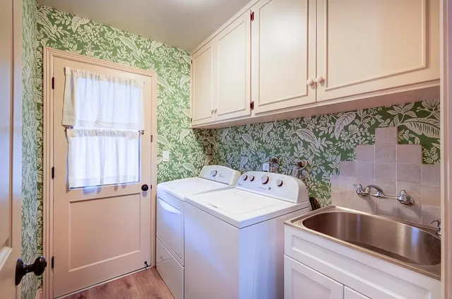 a view of bathroom with dual sinks