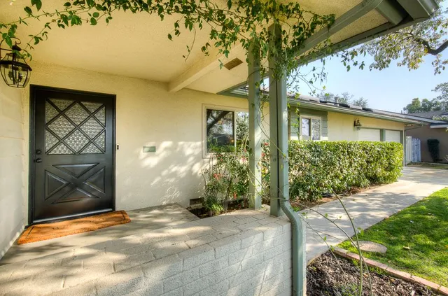 a view of entrance to house and yard