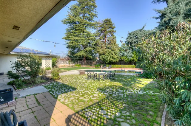 a view of a lake with a yard