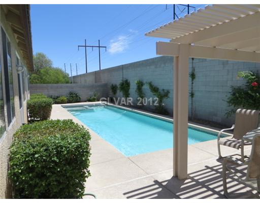 875 Sumner Ranch Road Henderson, NV 89012 - Photo 3 of 25 Swimming Pool/Hot Tub/Sauna. Sparkling Lap Pool and Spa!