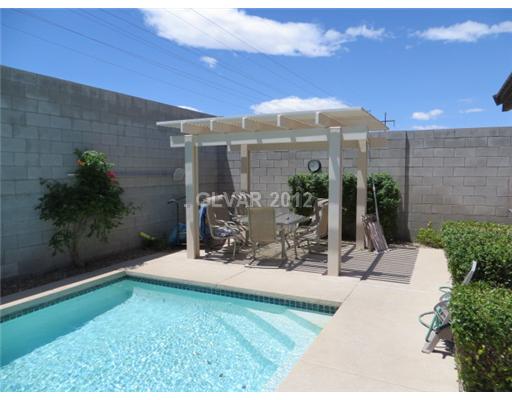 875 Sumner Ranch Road Henderson, NV 89012 - Photo 10 of 25 Exterior Back. Lovely Covered Patio!