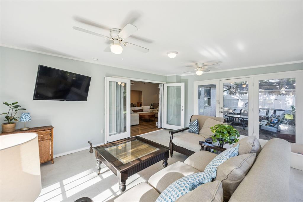 3284 Golfing Green Drive Farmers Branch, TX 75234 - Photo 13 of 25 a living room with furniture and a flat screen tv