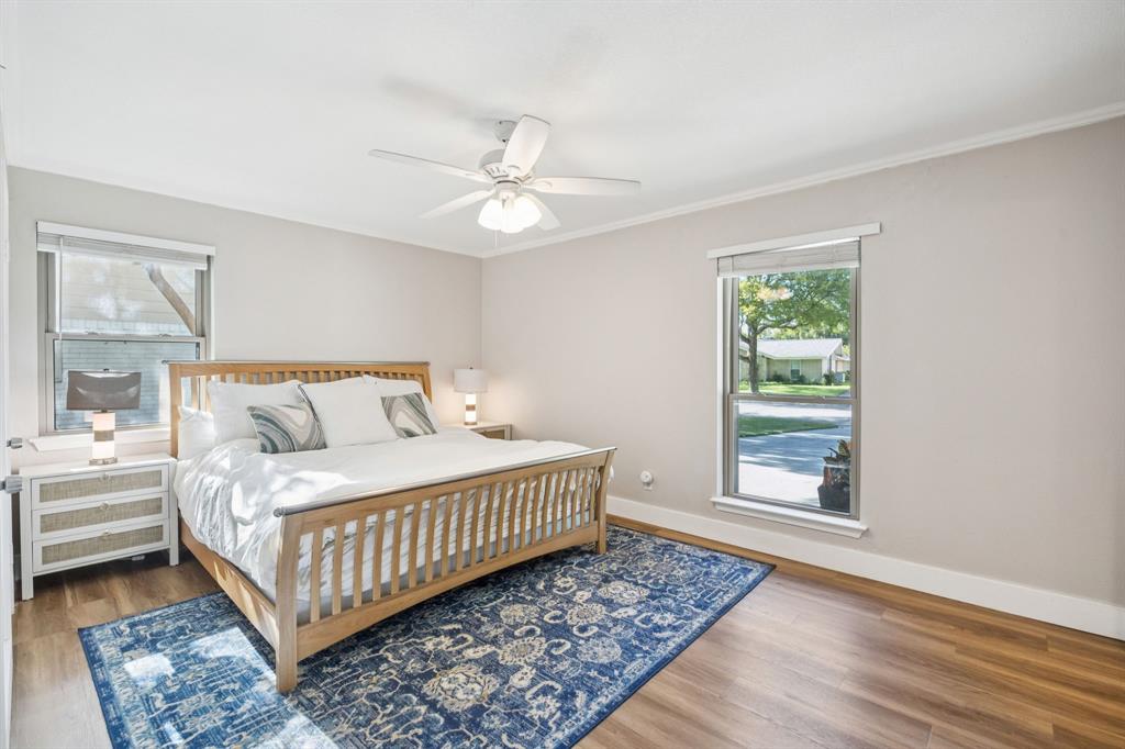 3284 Golfing Green Drive Farmers Branch, TX 75234 - Photo 14 of 25 a bedroom with a bed rug and window