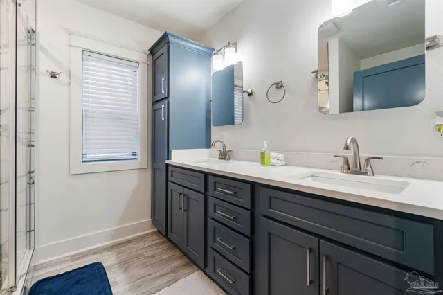 a dirty bathroom with white tiles