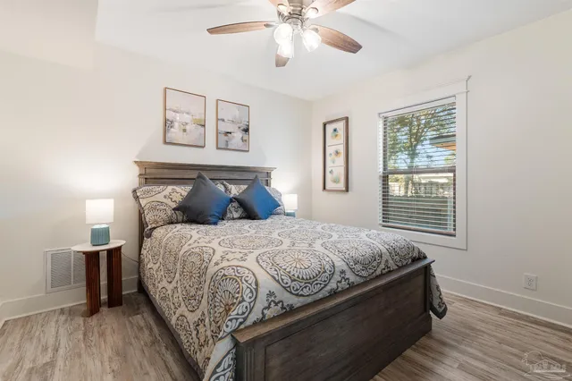 a view of backyard with seating and green space