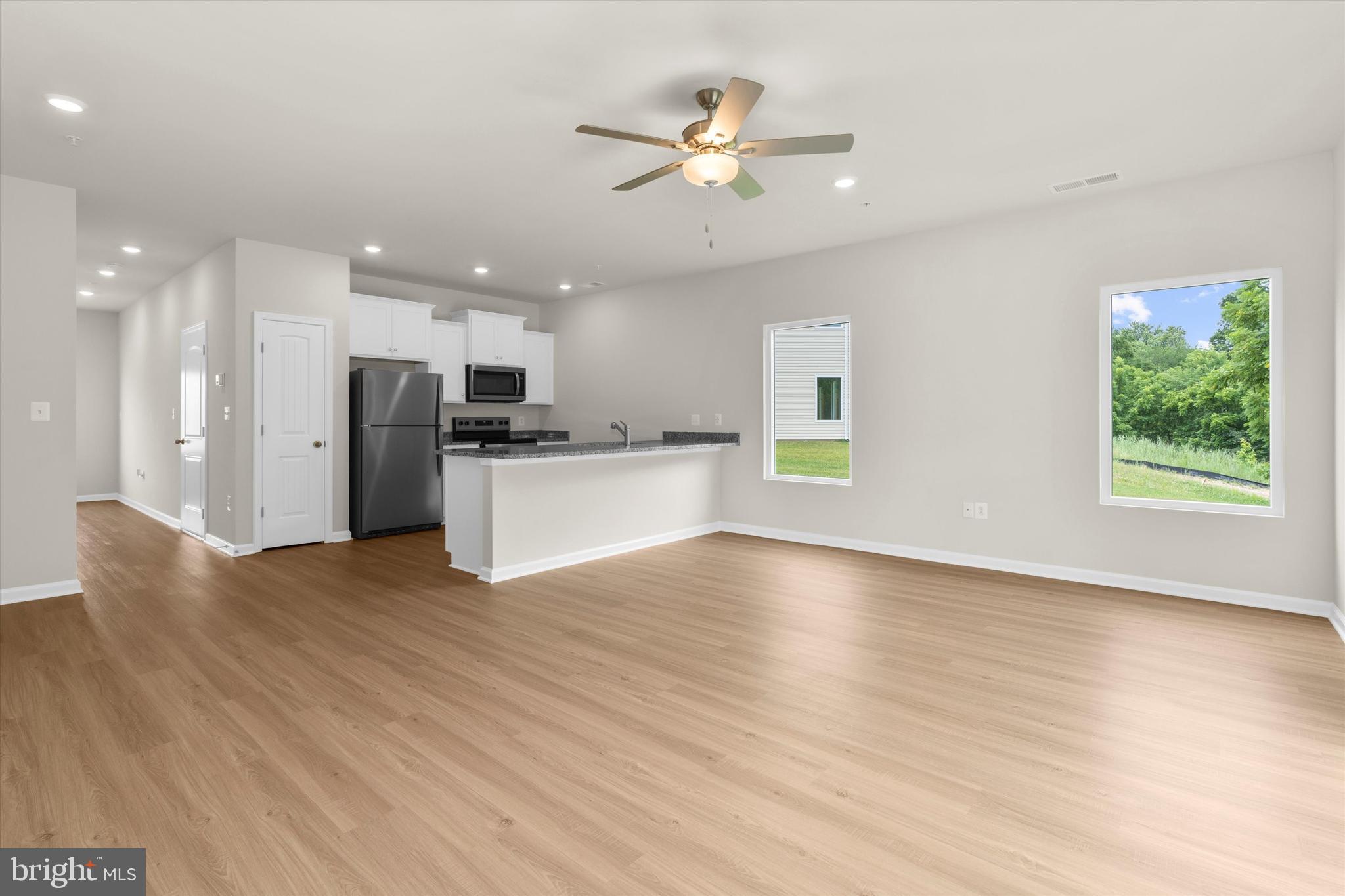 8135 Bartholomew Court Baltimore, MD 21206 - Photo 22 of 46 a view of a kitchen with a sink and a window