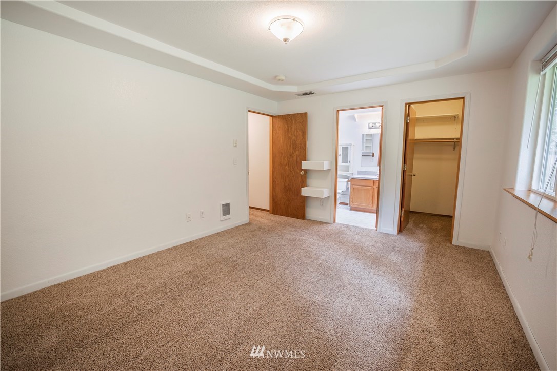 20 East Rd Of Tralee Shelton, WA 98584 - Photo 11 of 18 a view of empty room with window and bathroom view