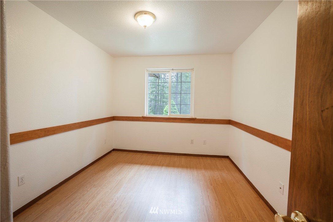 20 East Rd Of Tralee Shelton, WA 98584 - Photo 14 of 18 a view of room with window and wooden floor