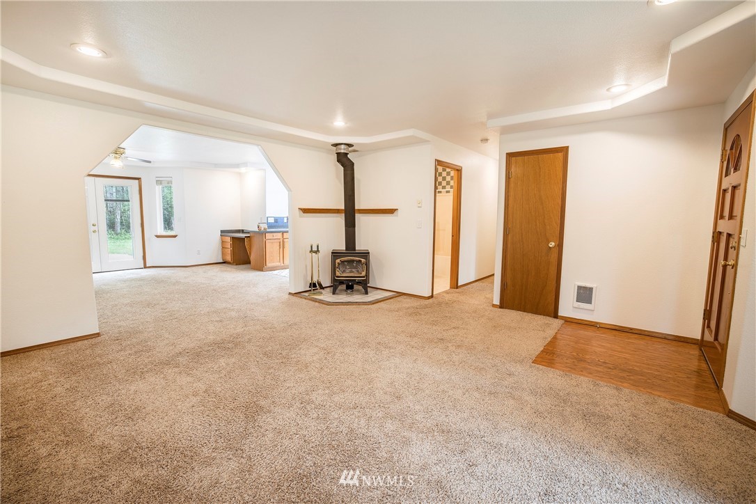 20 East Rd Of Tralee Shelton, WA 98584 - Photo 5 of 18 a view of a livingroom with a staircase
