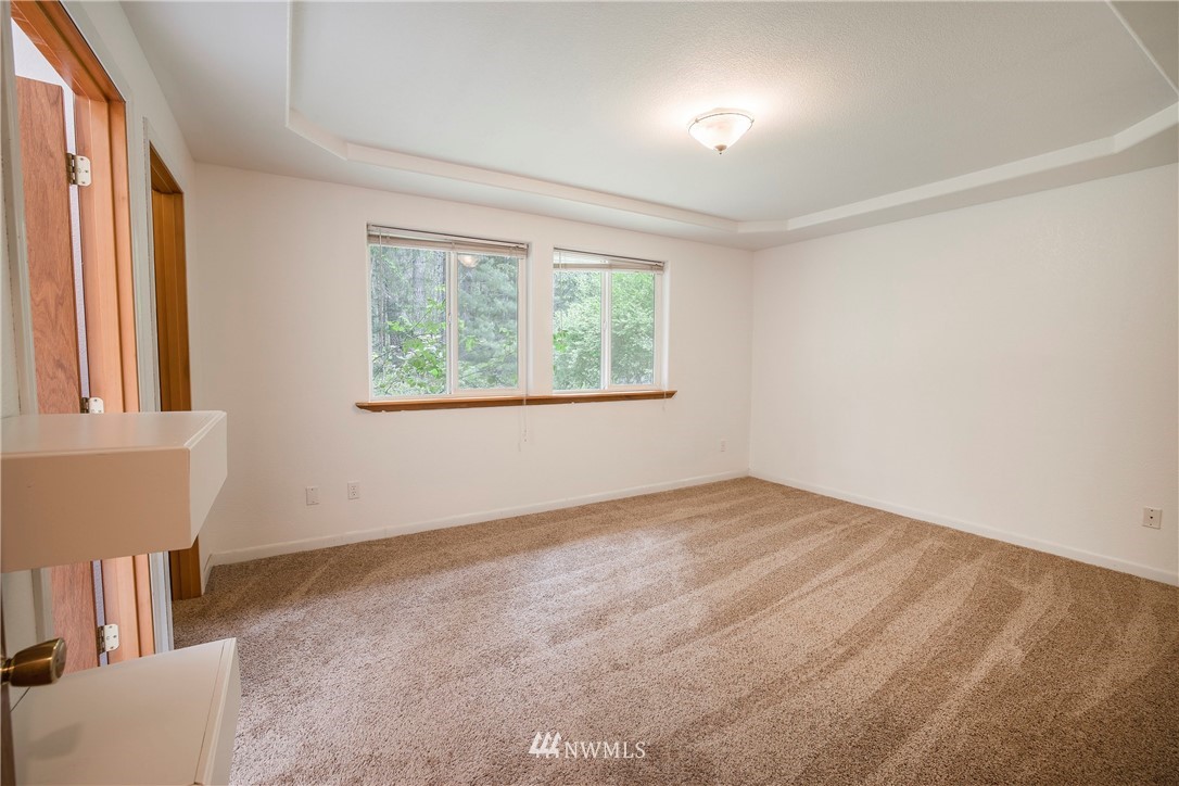20 East Rd Of Tralee Shelton, WA 98584 - Photo 10 of 18 an empty room with windows