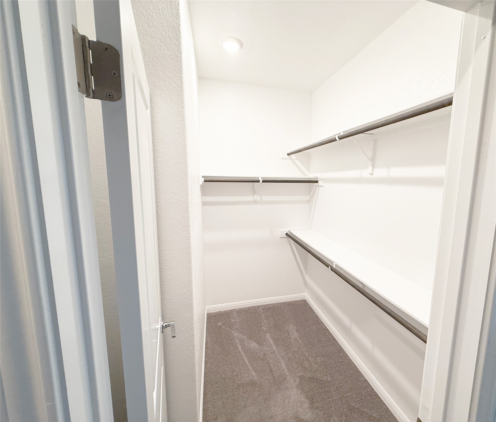 9015 Cattle Baron Path, Unit 605 Austin, TX 78747 - Photo 9 of 20 Primary Walk in closet with carpet