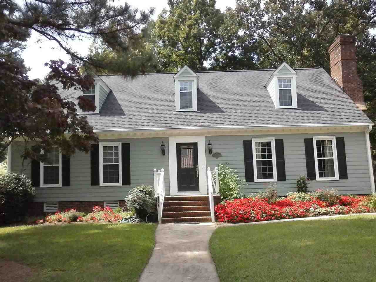 8709 Campfire Trail Raleigh, NC 27615 - Photo 2 of 25 a front view of a house with a garden