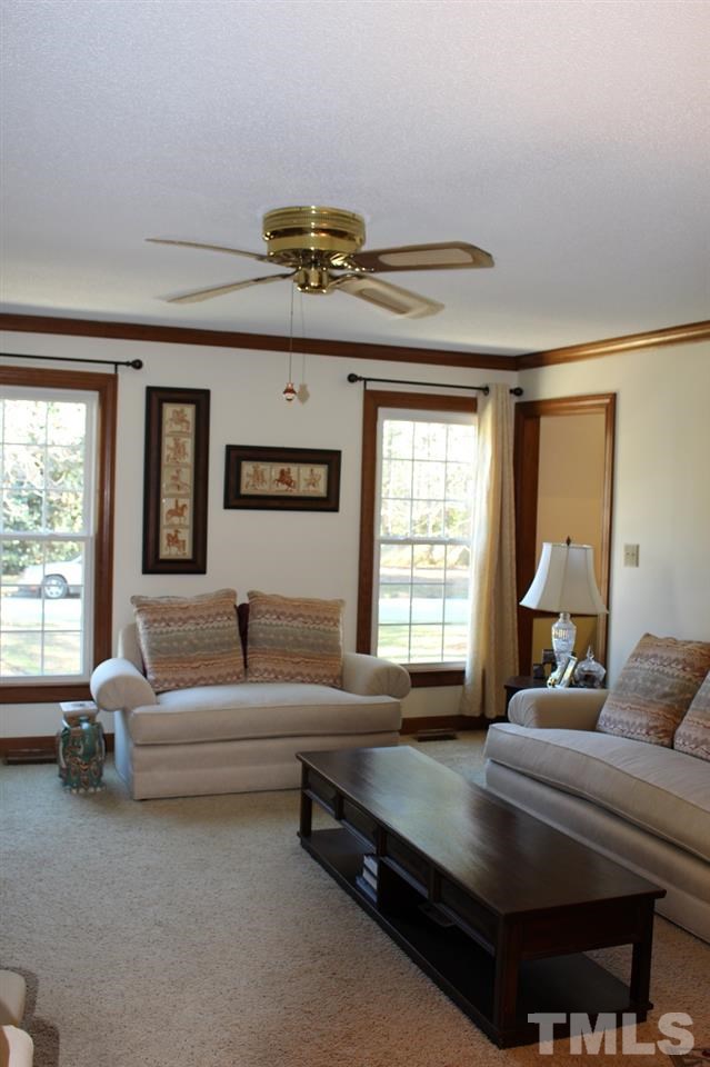 8709 Campfire Trail Raleigh, NC 27615 - Photo 10 of 25 a living room with furniture and a window