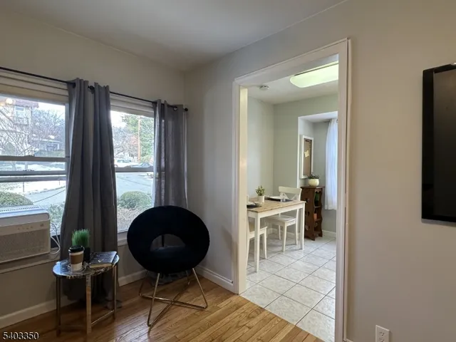 a kitchen with a sink cabinets and window