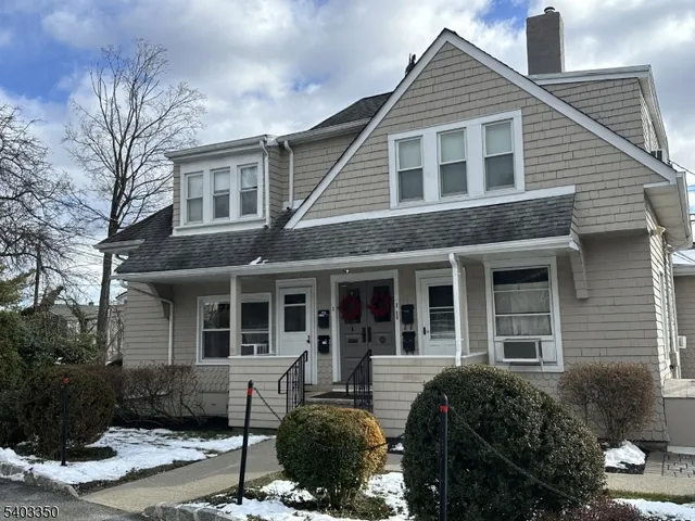 a view of a house with entryway and windows