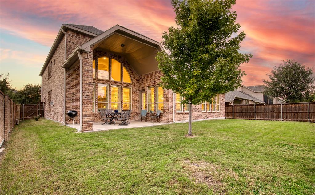 7760 Hackamore Street Frisco, TX 75036 - Photo 32 of 40 Lovely backyard with grassy area & tree.