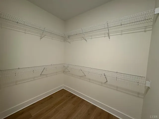 a view of a room with racks on the wall