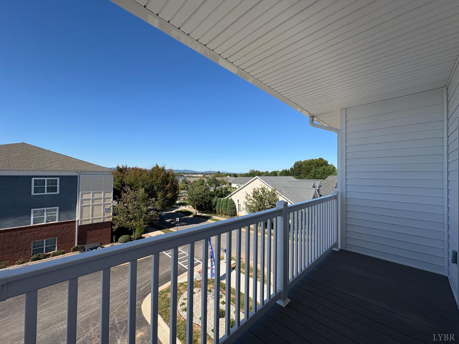 420 Capstone Drive, Unit 306 Lynchburg, VA 24502 - Photo 19 of 37 a view of a balcony with an outdoor space