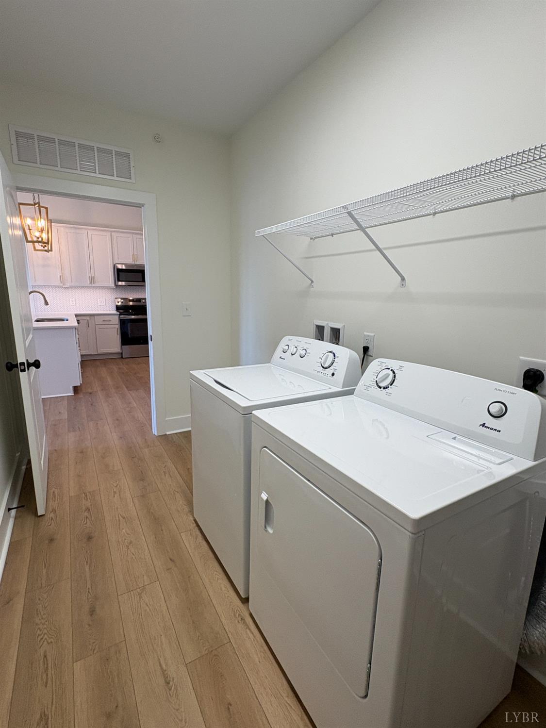 420 Capstone Drive, Unit 306 Lynchburg, VA 24502 - Photo 7 of 37 a utility room with dryer and washer
