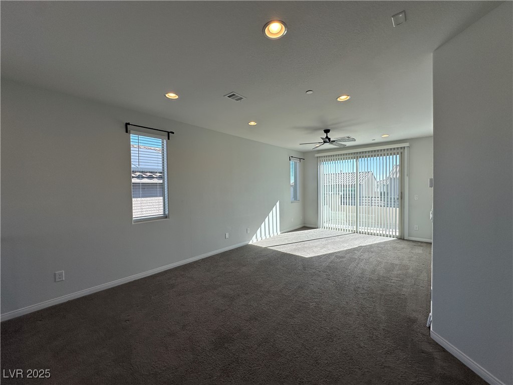 11585 Salt Creek Avenue Las Vegas, NV 89138 - Photo 21 of 45 Unfurnished room featuring recessed lighting and dark carpet