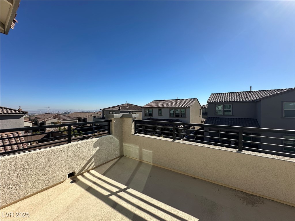 11585 Salt Creek Avenue Las Vegas, NV 89138 - Photo 25 of 45 Balcony with a residential view