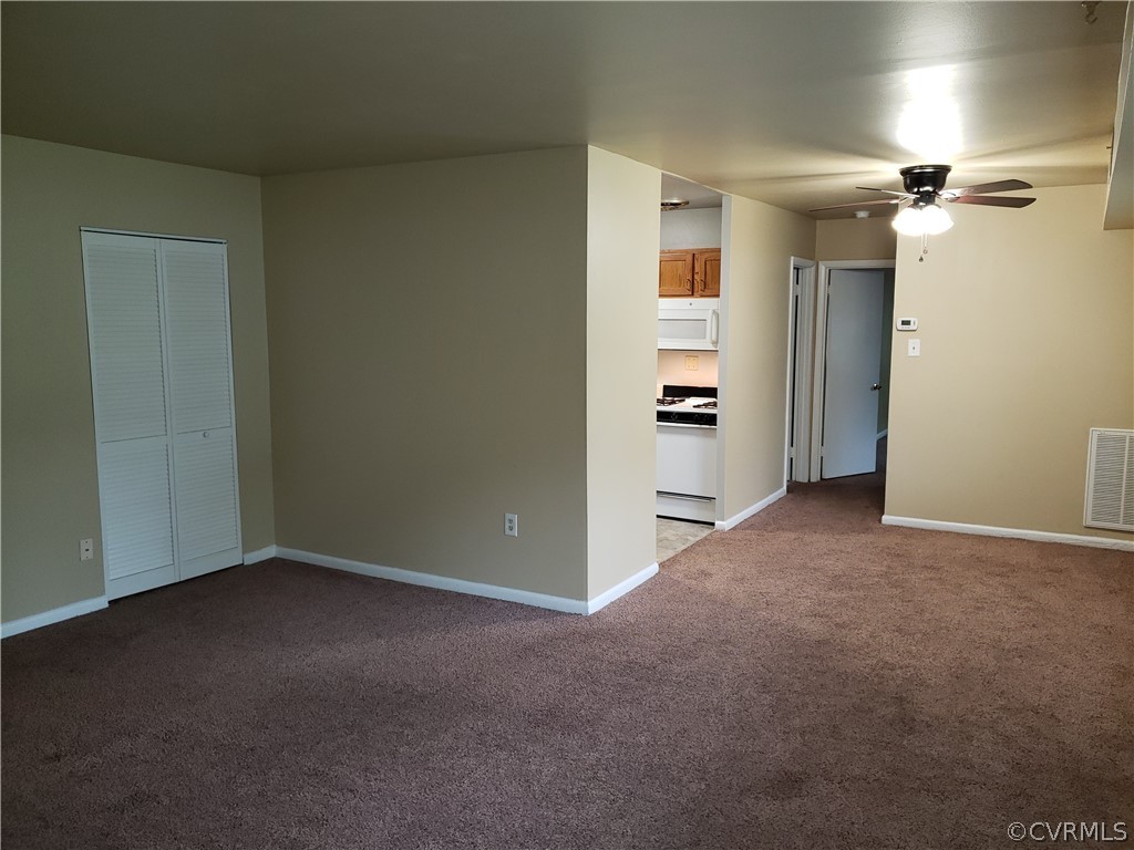 5612 Crenshaw Road, Unit 1113 Richmond, VA 23227 - Photo 15 of 19 a view of a room with an empty space