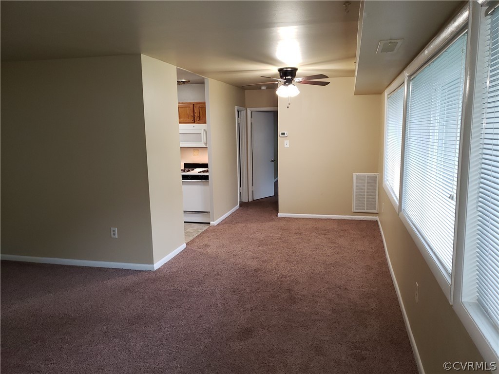 5612 Crenshaw Road, Unit 1113 Richmond, VA 23227 - Photo 16 of 19 a view of a room with an empty space