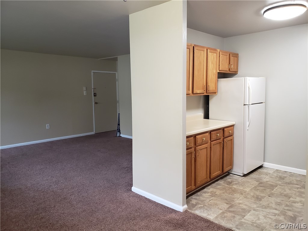 5612 Crenshaw Road, Unit 1113 Richmond, VA 23227 - Photo 2 of 19 a view of kitchen and utility room