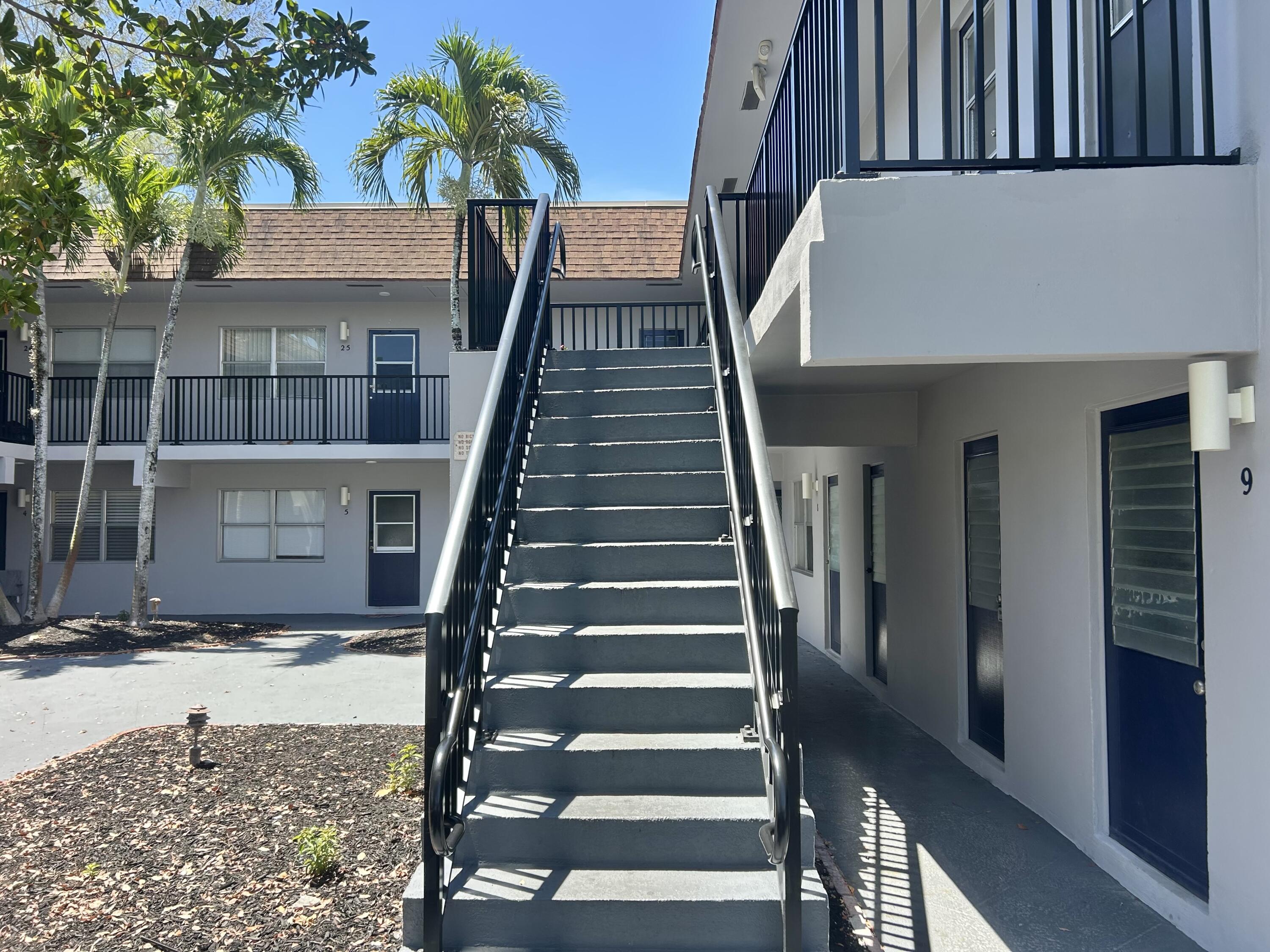 260 Northwest 19th Street, Unit 290 Boca Raton, FL 33432 - Photo 3 of 18 a view of front door of house