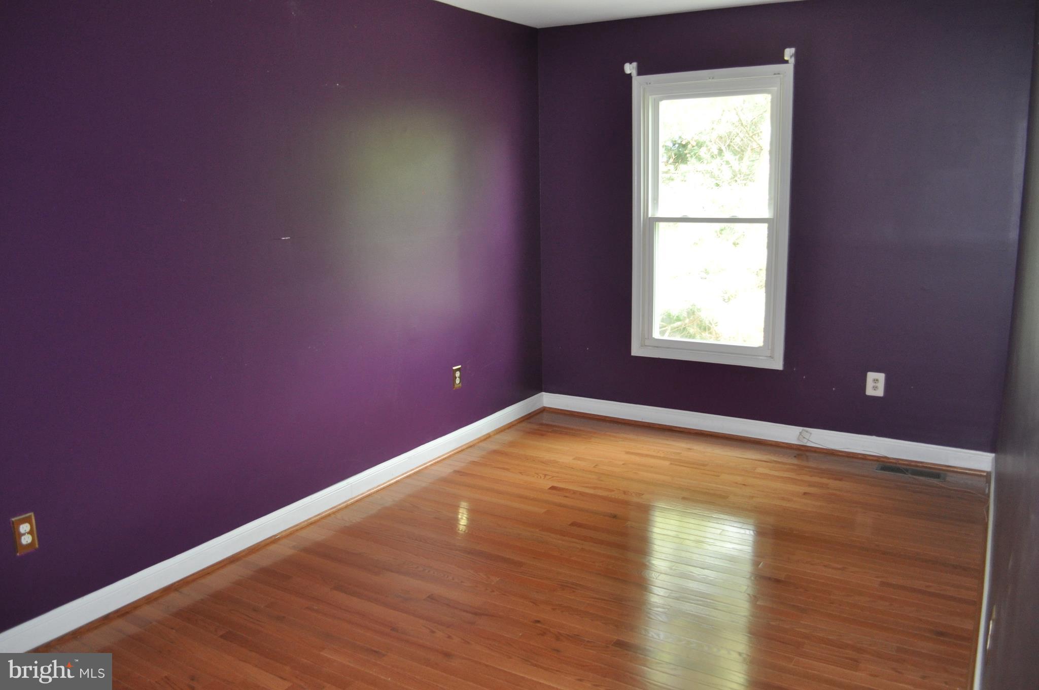 14616 Falling Leaf Way Gaithersburg, MD 20878 - Photo 13 of 23 a view of empty room with wooden floor and fan
