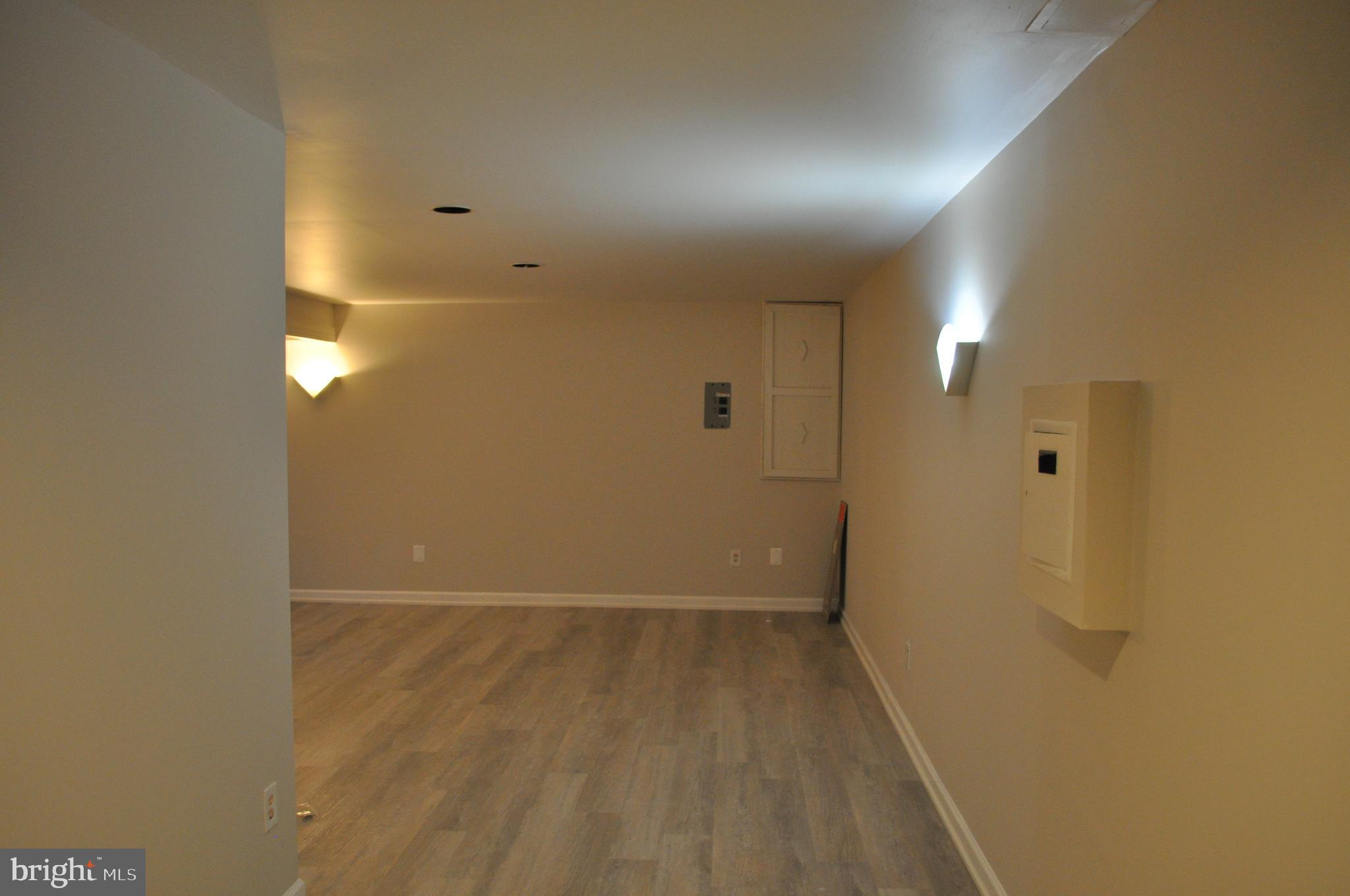 14616 Falling Leaf Way Gaithersburg, MD 20878 - Photo 17 of 23 a view of a room with wooden floor