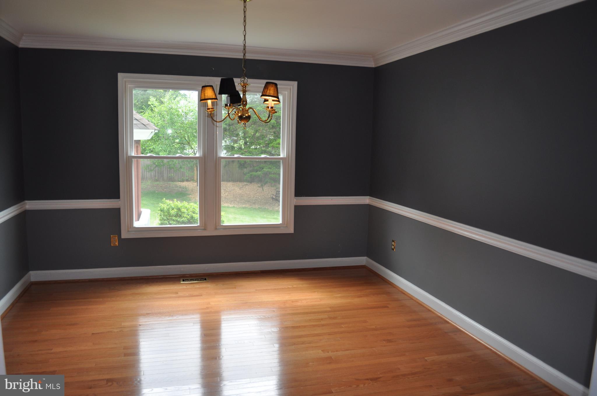 14616 Falling Leaf Way Gaithersburg, MD 20878 - Photo 5 of 23 a view of an empty room with a window