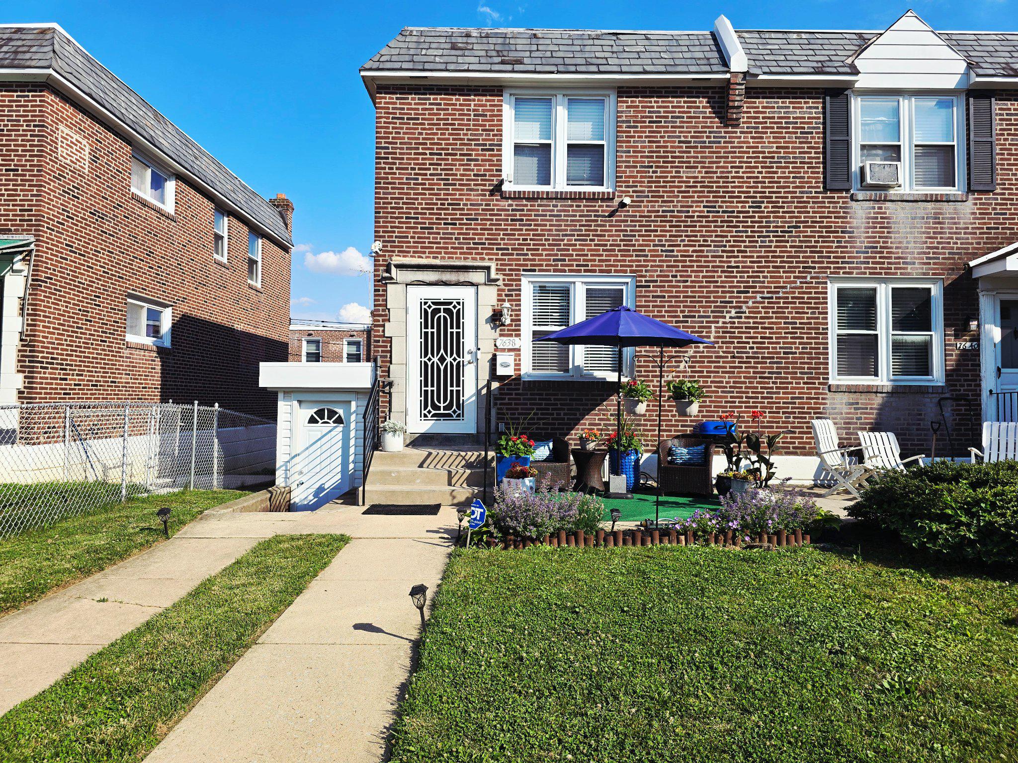 7638 Sherwood Road Philadelphia, PA 19151 - Photo 2 of 21 Charming brick home with inviting patio