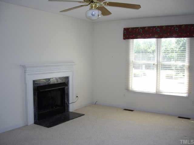 1418 Mt Pleasant Road Willow Spring, NC 27592 - Photo 3 of 10 Family Room w/Gas Log Fireplace.