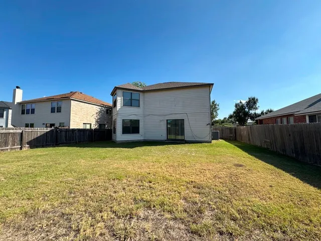 a house view with a outdoor space