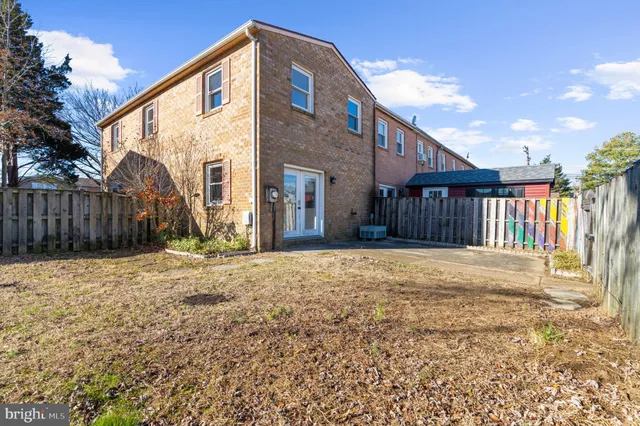 a house view with a backyard space