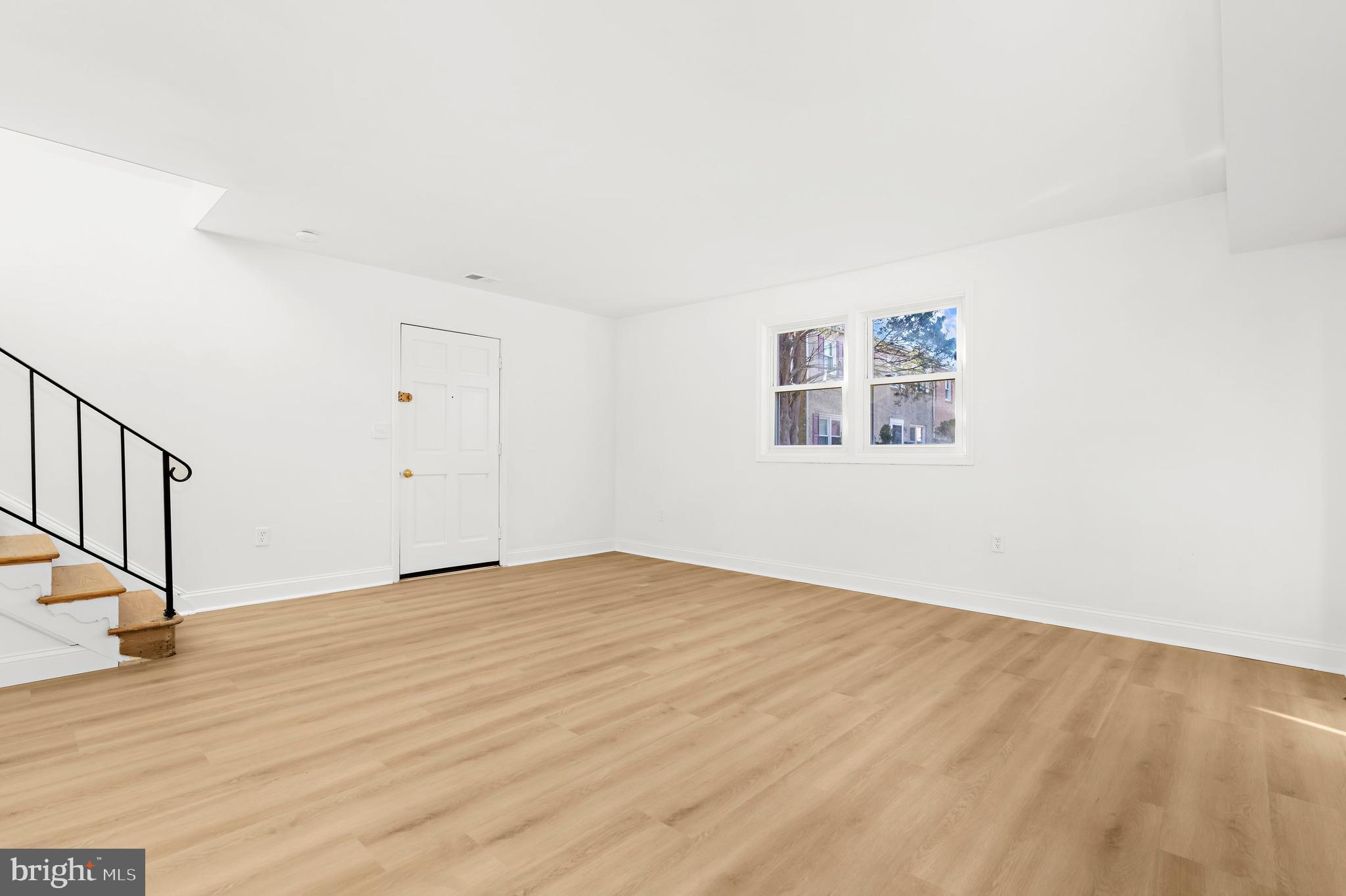 615 Bywater Road Annapolis, MD 21401 - Photo 10 of 28 a view of an empty room with wooden floor