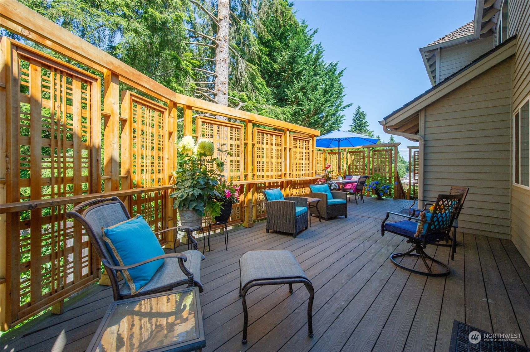 3427 112th Place Southeast Everett, WA 98208 - Photo 8 of 26 a view of a patio with couches table and chairs and potted plants