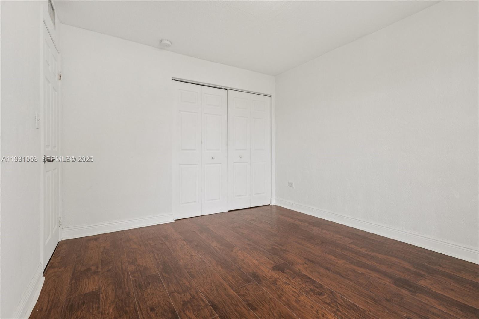 7232 Southwest 94th Place, Unit E6 Miami, FL 33173 - Photo 15 of 31 a view of small space with wooden floor