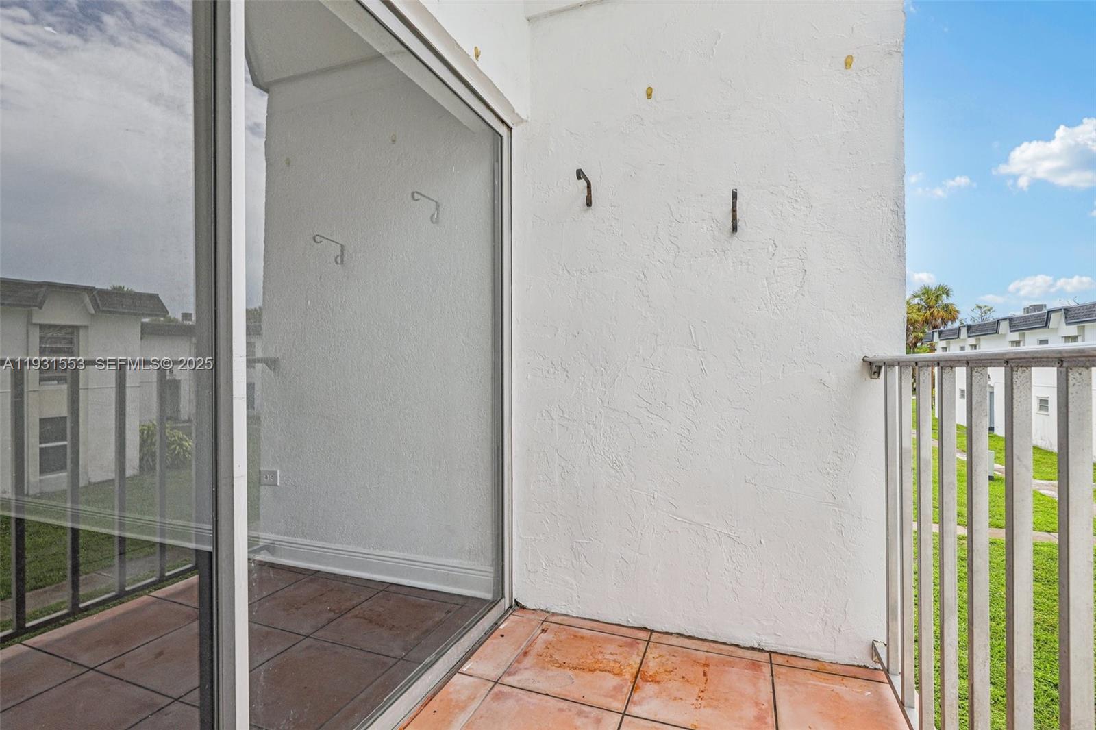 7232 Southwest 94th Place, Unit E6 Miami, FL 33173 - Photo 28 of 31 a view of entrance