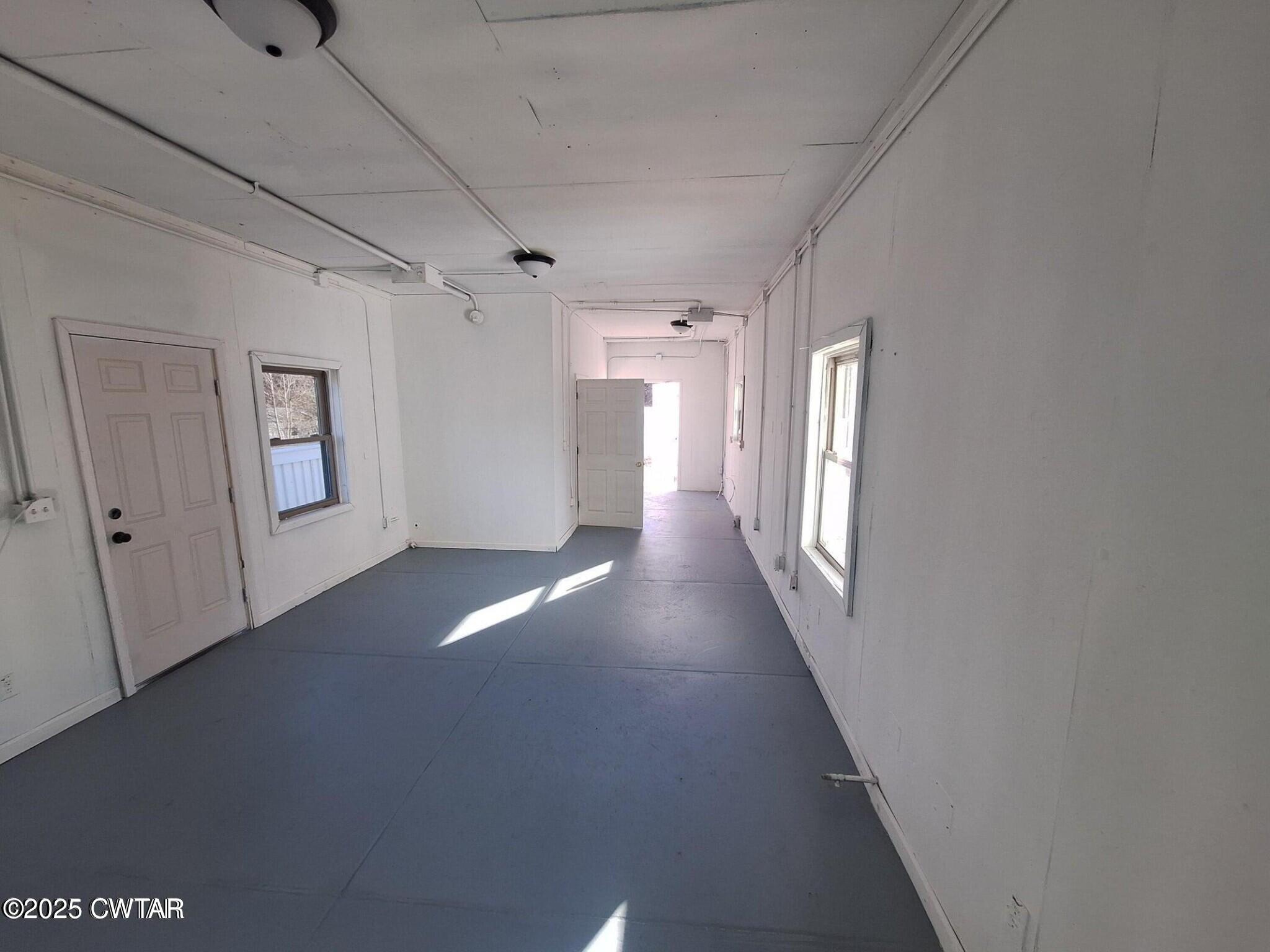 600 Highway 64 Adamsville, TN 38310 - Photo 21 of 25 a view of a hallway with staircase